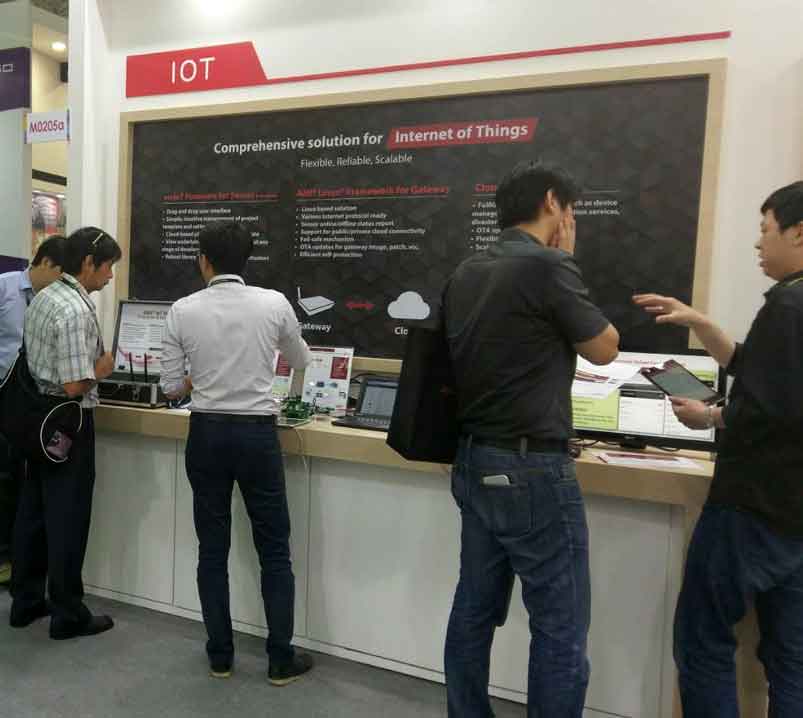 Group of people interacting with AMI booth